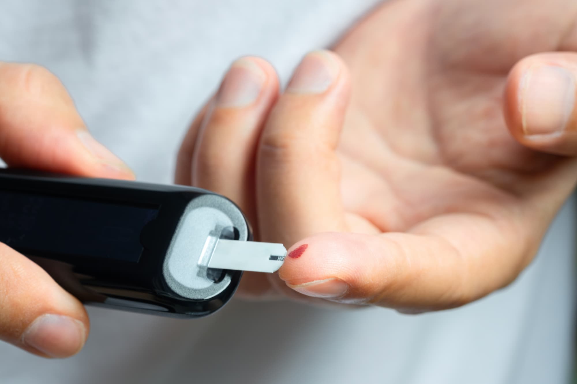 a finger prick for a blood sample
